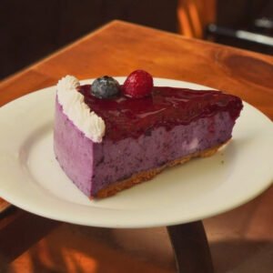 Cheesecake de sauco (porción)